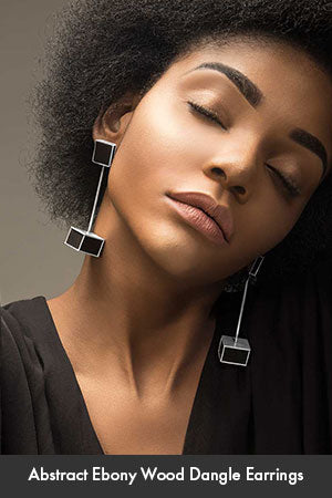 Model wearing ebony wood subtle-statement earrings