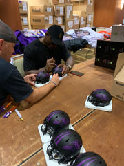 Ray Lewis signing Eclipse Mini helmets