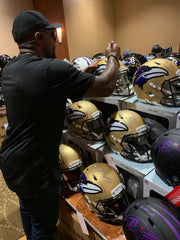 Ray Lewis signing Amp and Eclipse Helmets