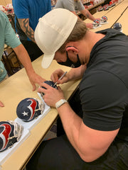 JJ Watt signing Houston Texans mini helmets