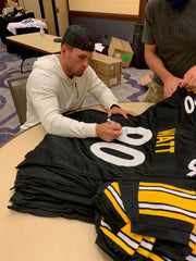 TJ Watt signing custom jersey