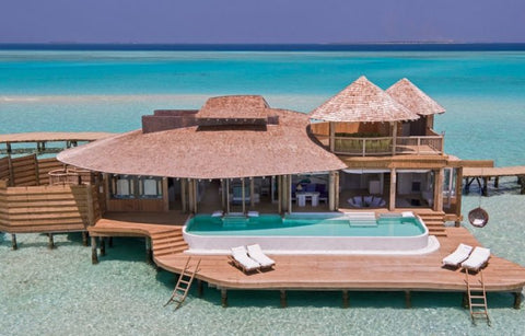house on top of the beach in the maldives