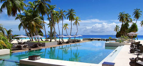 poolside of a luxury resort in maldives