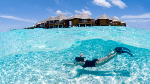 snorkeling in a resort in the maldives