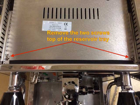 removing the top reservoir tray from the top of your quick mill espresso machine
