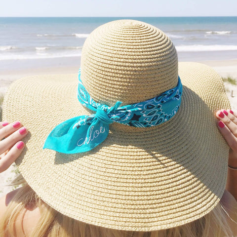 Moon and Lola custom personalized embroidered bandana on your straw hat at the beach