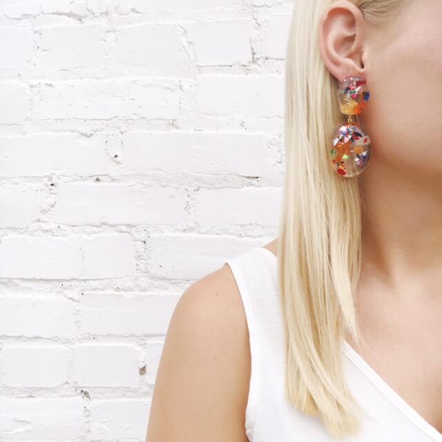 Moon and Lola thimblepress resin confetti earrings in warm colors