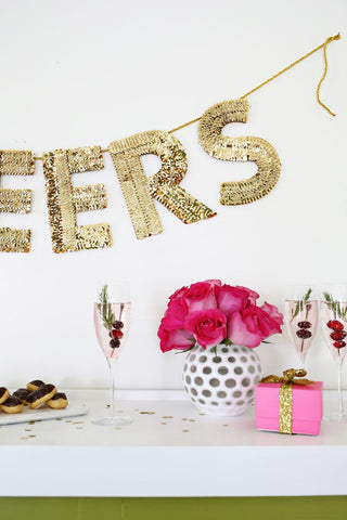 a beautiful mess sequin banner cheers how to diy