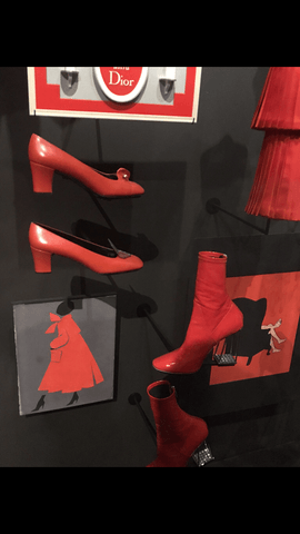 moon and lola red shoes and boots at dior in paris france