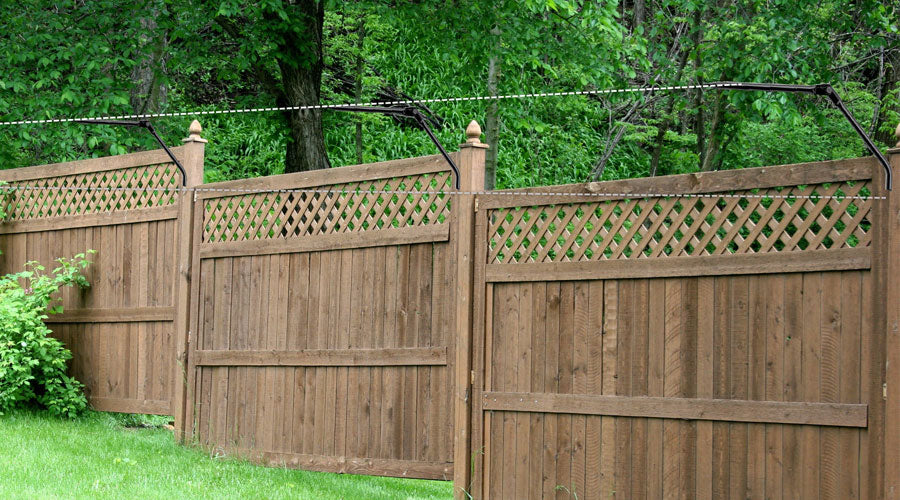 Existing fence steps up and down