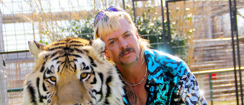 Big cats documentary star - Joe Exotic, posing with tiger 