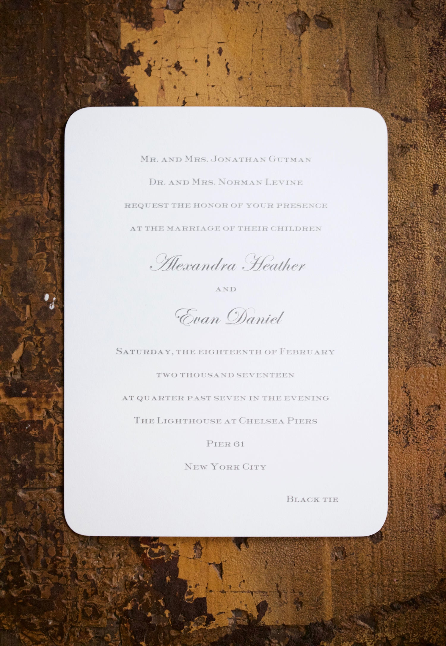 Alex & Evan is an engraved wedding suite set in NYC. Empire size natural white classic crest double thick paper in pewter ink with rounded corners and navy edge painting. Call us toll-free at 1-800-995-1549 or email us at hello@pickettspress.com