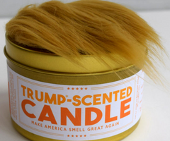 Donal Trump Scented Candle with a little wig like Donald's hair on top of the lid