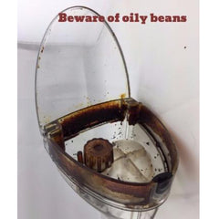 Brew Unit of a Superautomatic Showing Oily Coffee Beans Have Been Used