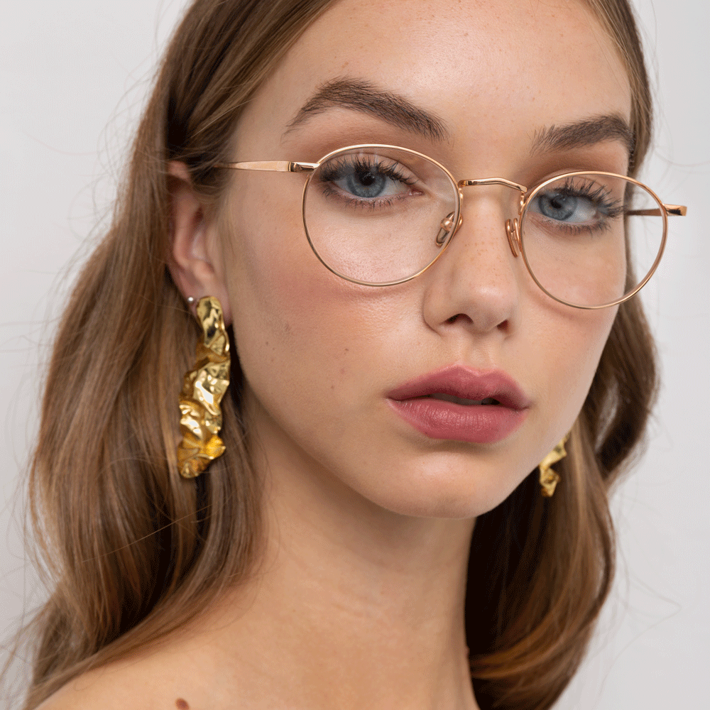 Bronson Oval Glasses in Rose Gold frame by LINDA FARROW – LINDA FARROW