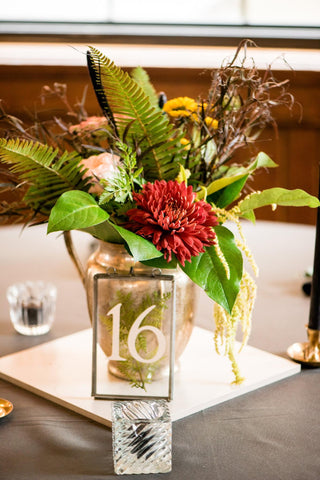 moody and romantic table arrangement