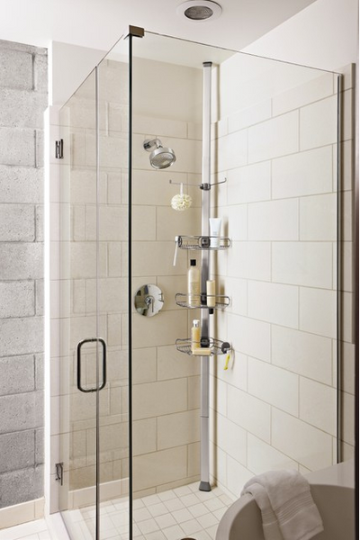 small but clean shower with glass doors and tension rod shower caddy, large white subway tiles... 5 Steps to Make Your Small Shower Look Bigger Without Remodeling from Bathroom Bliss by Rotator Rod 