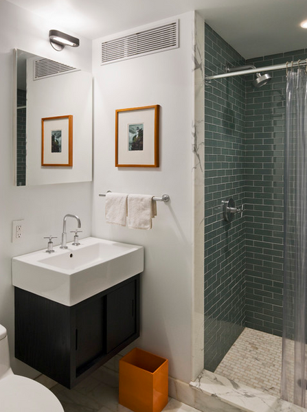 small white bathroom with small shower, blue-green subway tile with white grout; the transparent shower curtain makes the space look bigger... 5 Steps to Make Your Small Shower Look Bigger Without Remodeling from Bathroom Bliss by Rotator Rod 