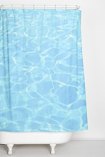 blue pool water shower curtain with white freestanding bathtub... 6 Perfect Beach Shower Curtains for Summer from Bathroom Bliss by Rotator Rod