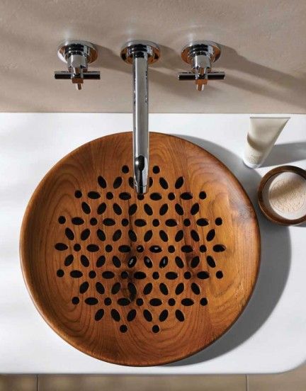 beautiful handcrafted wood sink with delicate flower pattern... Bathroom Design Ideas: Beautiful Sink Inspiration from Bathroom Bliss by Rotator Rod