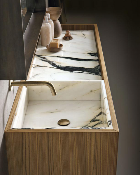custom white Italian marble with dark veining sink and vanity... Bathroom Design Ideas: Beautiful Sink Inspiration from Bathroom Bliss by Rotator Rod