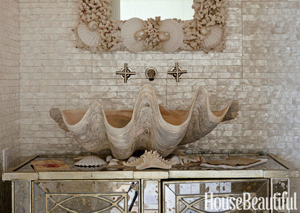 whimsical bathroom with mother of pearl tiles and oversized clam shell as a sink, like in The Little Mermaid!... Bathroom Design Ideas: Beautiful Sink Inspiration from Bathroom Bliss by Rotator Rod