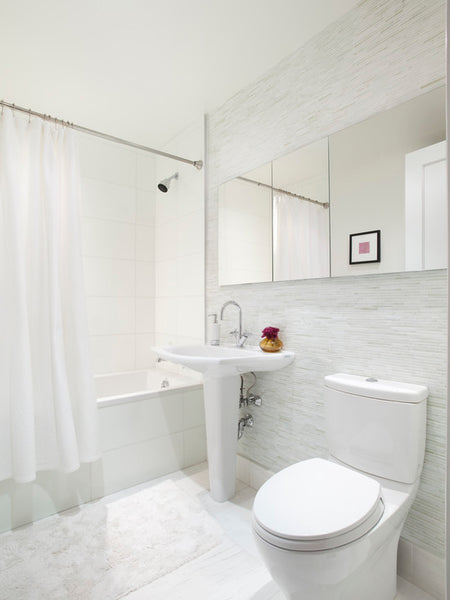 beautiful light gray bathroom with tile & white shower curtain... Bathroom Design Trends: Gorgeous Gray Inspiration