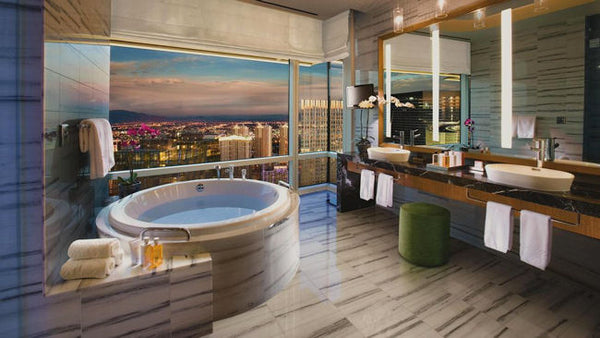 luxurious Las Vegas bathroom with jet tub and city views... Beautiful Bathroom Inspiration: Big City Style