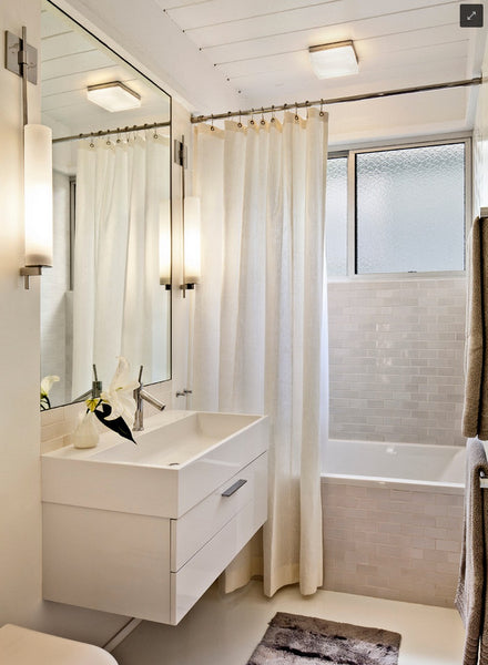 contemporary white bathroom with subway tiles and an extra long shower curtain hung close to the ceiling, making the bathroom look HUGE!... Beautiful Bathroom Inspiration: Contemporary Shower Curtain Ideas from Bathroom Bliss by Rotator Rod