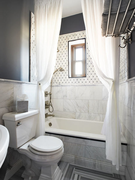 contemporary white bathroom with two extra long shower curtains hung close to the ceiling making the bathroom look HUGE!... Beautiful Bathroom Inspiration: Contemporary Shower Curtain Ideas from Bathroom Bliss by Rotator Rod