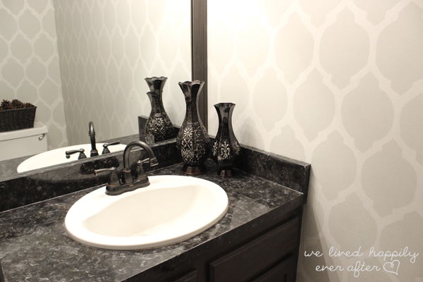 beautiful gray bathroom with DIY faux granite... Easy Bathroom Updates for a More Luxurious Rental Apartment