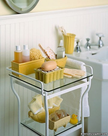 cute yellow and white bathroom shelves full of guest bathroom essentials... Prepare for Holiday House Guests with a Well Stocked Guest Bathroom from The Bathroom Bliss Blog by Rotator Rod