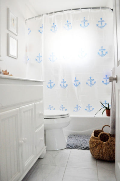 chic beach cottage bathroom with anchor shower curtain on a curved shower rod... Quick Fix Bathroom Ideas: Expand Shower Space Easily with a Curved Shower Rod from Bathroom Bliss by Rotator Rod