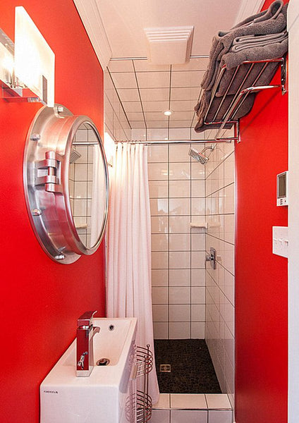 narrow modern bathroom with bright red and white walls, white and chrome accents... Red Bathroom Inspiration from Bathroom Bliss by Rotator Rod 