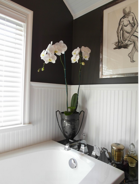 black and white bathroom with bathtub, orchid flowers and artwork... Sleek & Sexy Black Bathroom Designs from Bathroom Bliss by Rotator Rod