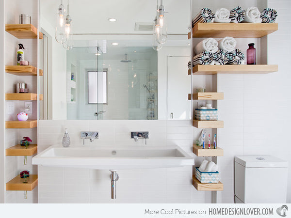 small but stylish and organized white bathroom with shelves up the walls... Small Bathroom Chic: Space Saving Solutions from Bathroom Bliss by Rotator Rod