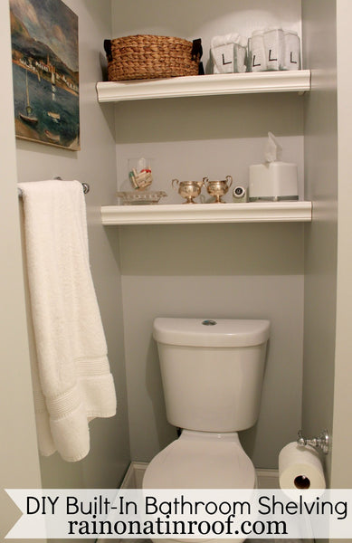 small bathroom with decorative shelves running up the wall behind the toilet... Small Bathroom Chic: Space Saving Solutions from Bathroom Bliss by Rotator Rod