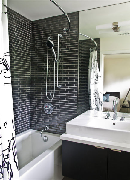 small black and white bathroom with black subway tile, curved shower rod... Small Bathroom Ideas: Shower Spaces from Bathroom Bliss by Rotator Rod