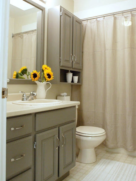 small gray bathroom with shower curtain, sunflowers, dark gray cabinets... Small Bathroom Ideas: Shower Spaces from Bathroom Bliss by Rotator Rod