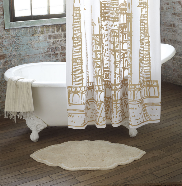 gold and white Taj Mahal shower curtain in brick bathroom with wood floors...Sophisticated Fall Shower Curtains for Guest Bathrooms from The Bathroom Bliss Blog by Rotator Rod