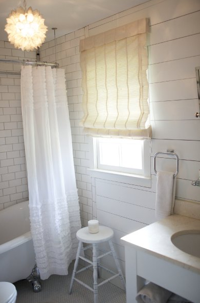 lovely small white bathroom with white ruffled shower curtain, subway tile, chair... Trending in Bathroom Decor: Airy, White Shower Curtains from Bathroom Bliss by Rotator Rod