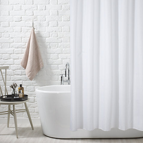 modern bathroom with white painted brick, freestanding bathtub, and white shower curtain... Trending in Bathroom Decor: Airy, White Shower Curtains from Bathroom Bliss by Rotator Rod