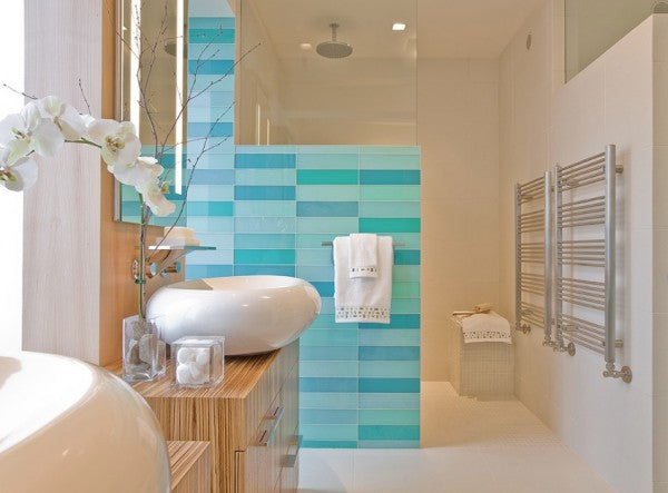 lovely modern neutral bathroom with large blue and aqua glass subway tiles... Trending in Bathroom Decor: Glass Tile from Bathroom Bliss by Rotator Rod