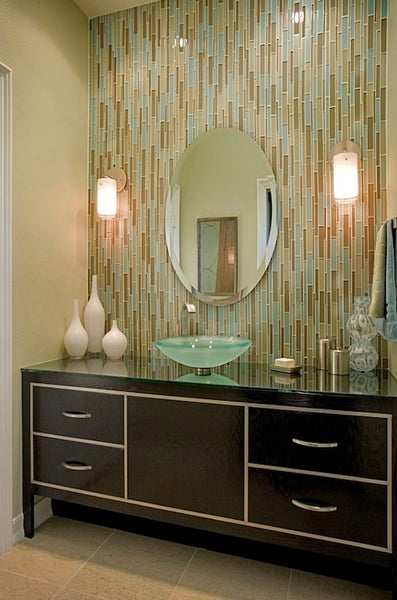 dark bathroom vanity with vertical glass tile linear mosaic backsplash, oval mirror... Trending in Bathroom Decor: Glass Tile from Bathroom Bliss by Rotator Rod