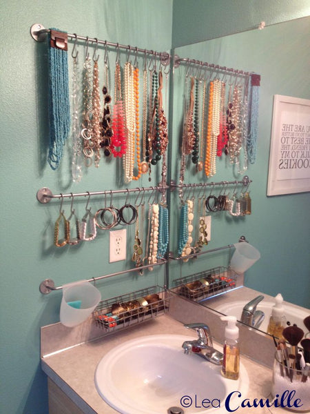gorgeous jewelry bathroom wall display created out of repurposed Ikea items... Trending in Bathroom Decor: Stylish Jewelry Stands from Bathroom Bliss by Rotator Rod