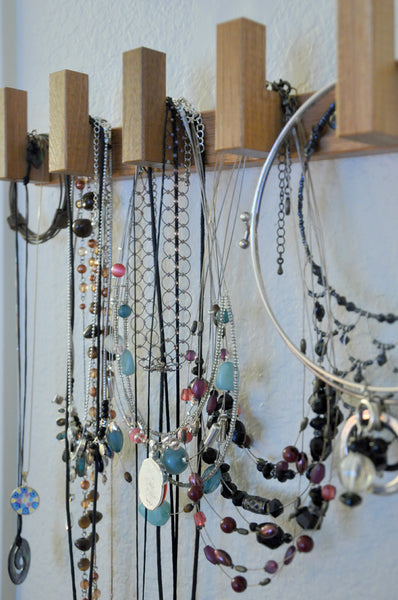 gorgeous jewelry wall display created out of repurposed Ikea items... Trending in Bathroom Decor: Stylish Jewelry Stands from Bathroom Bliss by Rotator Rod