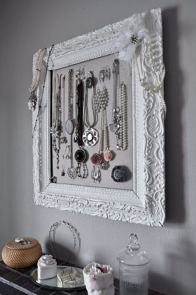 elegant and feminine white frame bathroom jewelry holder... Trending in Bathroom Decor: Stylish Jewelry Stands from Bathroom Bliss by Rotator Rod