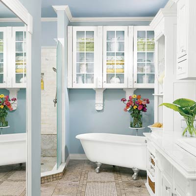 tranquil & spa-inspired light blue bathroom with white accents, flowers & freestanding bathtub... Trending in Bathroom Design: Blue Bathrooms from Bathroom Bliss by Rotator Rod
