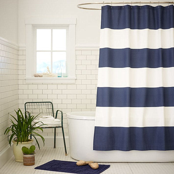 nautical bathroom with blue & white striped shower curtain... Trending in Bathroom Design: Blue Bathrooms from Bathroom Bliss by Rotator Rod