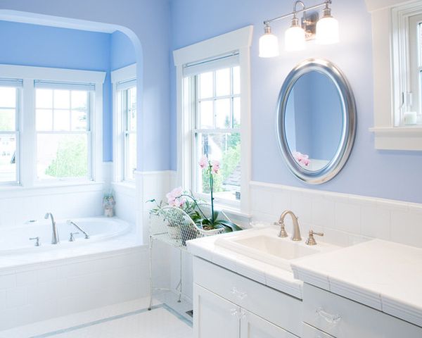 luxurious & feminine blue bathroom with white & silver accents & orchid flowers... Trending in Bathroom Design: Blue Bathrooms from Bathroom Bliss by Rotator Rod